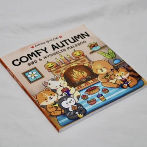Forside af Comfy Autumn malebog med efterårsmotiver, blade og hyggelige farver.